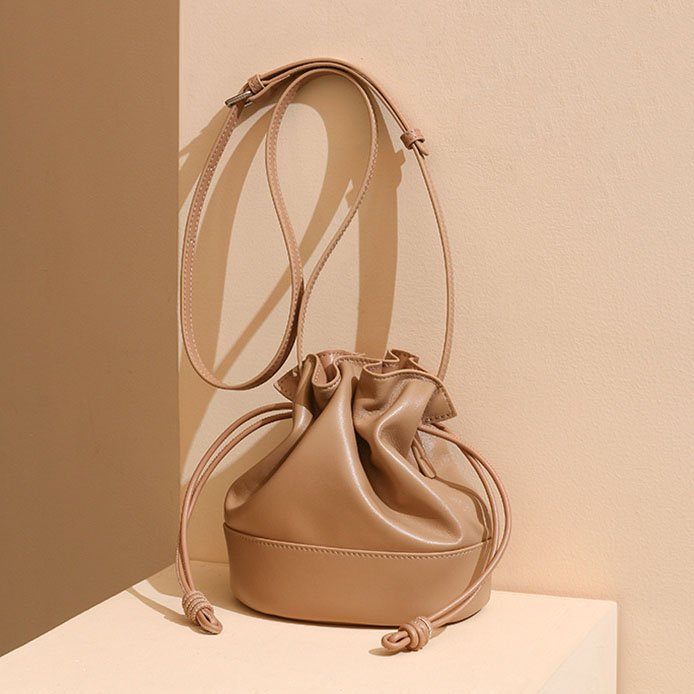 Drawstring Leather Small Crossbody Bag Nude on corner