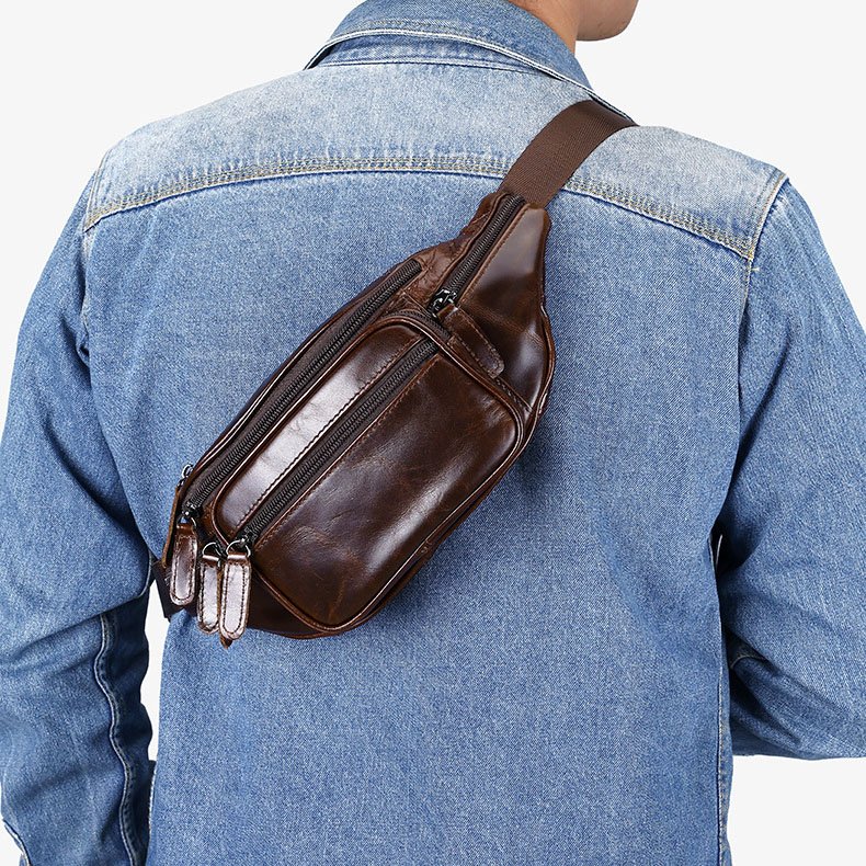 Multi Pocket Leather Crossbody Sling Bag Chocolate carrying on back,across body.