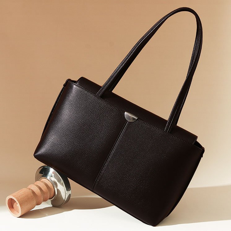 sloping Pebble Leather Large Tote Bag with Flap Black on a metal foot