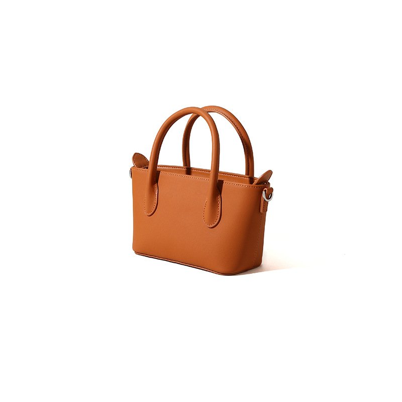 45 degree side of Calfskin Leather Mini Tote Bag Brown