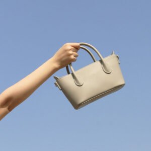 Calfskin Leather Mini Tote Bag grey carrying by hand,with blue sky
