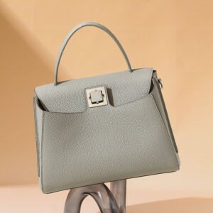 front of Togo Leather Top Handle Crossbody Bag with Square Turnlock Grey