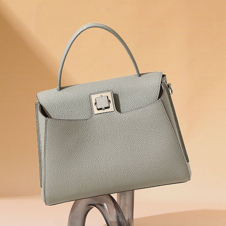front of Togo Leather Top Handle Crossbody Bag with Square Turnlock Grey