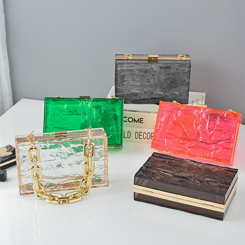 5 color bags of Uneven Transparent Acrylic Book Clutch Bag Ice on floor,ice,green,grey,pink,brown.